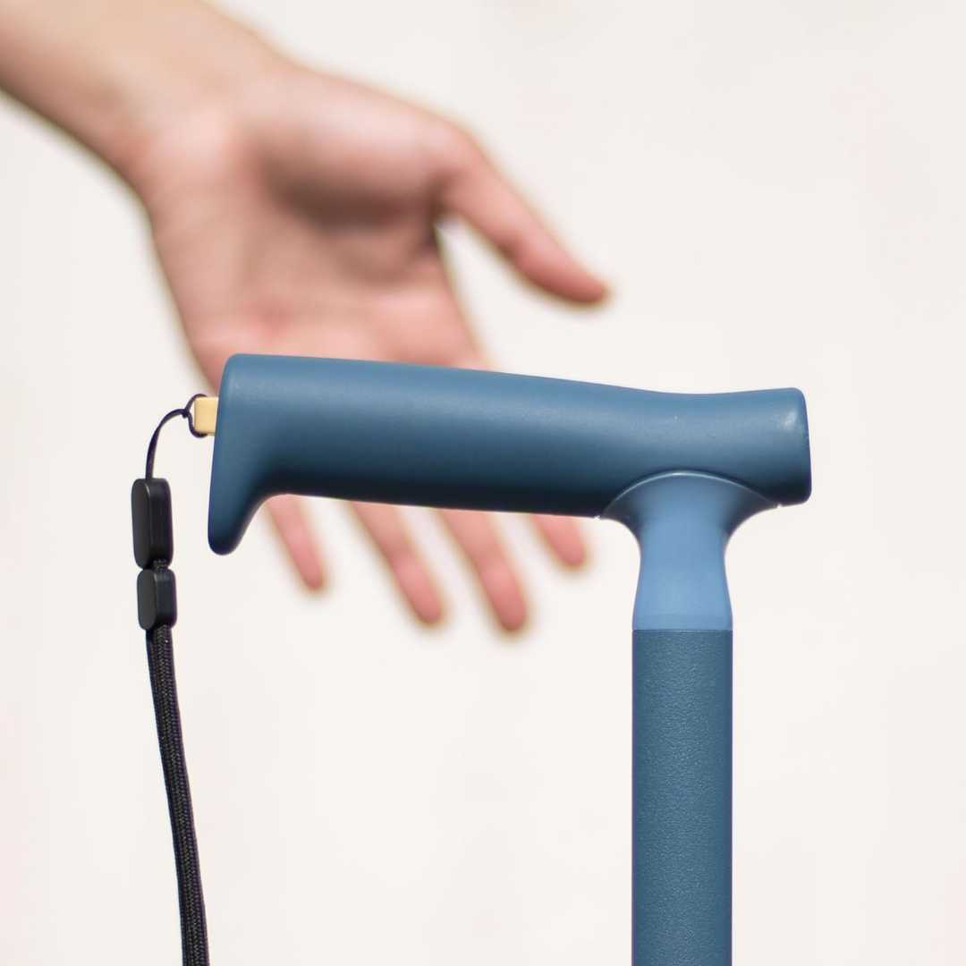 safe foldable cane for elderly adults, best walking cane for seniors, lightweight collapsible cane for travel, durable walking stick for balance support, stable free standing cane for seniors